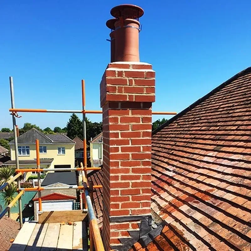Chimney repairs with safe access scaffolding in Kent